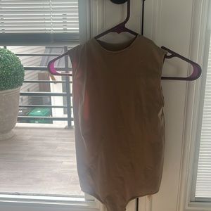 Skims bodysuit tank in a sand color